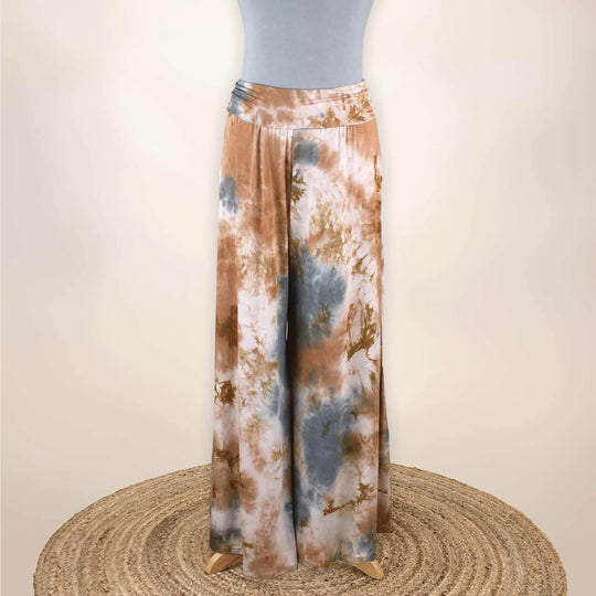 Tillie Tie Dye Gaucho Pants
Feel Zenful in our relaxed, loose fitting, Hand Tie-Dyed Gaucho Pants. Each garment is adorned with an unique, inspirational sentiment. Our exclusive fabric is made from the softest Rayon/Spandex material. One of a kind, square shape, exclusive, handmade, Rayon/Spandex Care:: Hand Wash Cold
Tillie Tie Dye Gaucho Pants
Feel Zenful in our relaxed, loose fitting, Hand Tie-Dyed Gaucho Pants. Each garment is adorned with unique, inspirational sentiment. Fabric: Rayon/Spandex 
SS2024C