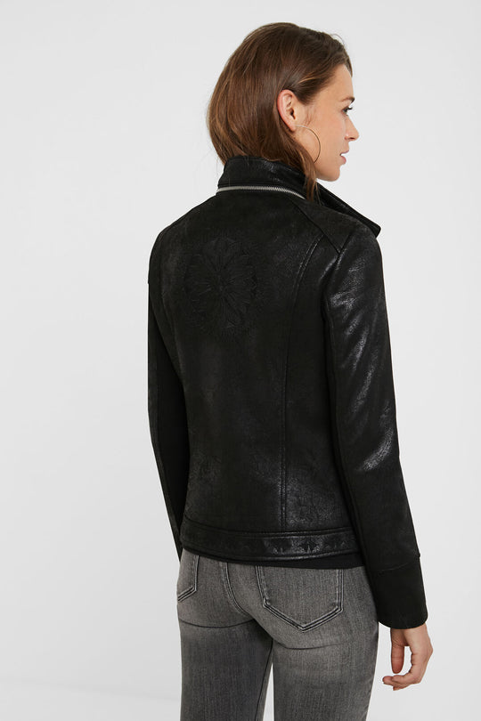 Slim Biker Jacket w/ Embroidery - Black
Slim Biker Jacket w/ Embroidery - Black Applied harmoniously, the embroideries of paisley tears provide a touch of subtle elegance to the back, the waist and the V-neck with lapels of this slim biker type jacket with crossed zip fastener. Its leather effect fabric shows a worn effect which is pure attitude. V-neck crossed with lapels Zip fastener Two pockets with zipper Multicolour floral print on inner lining Embroidery of matching mandalas High collar removable with