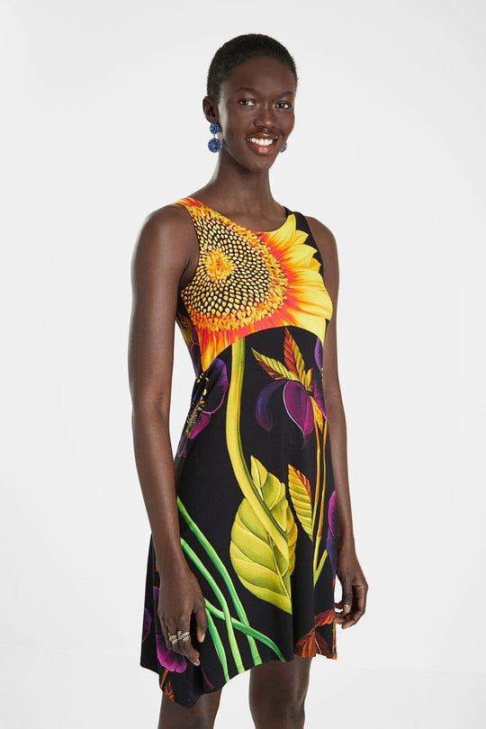 Sleeveless Sunflower Tank Dress - Marlon
You can already see that it's a sleeveless dress with round neck and with a big print of a sunflower. What you don't see is its nice feel, its drape and how comfortable it is to wear. Essential! DESIGNED BY M. CHRISTIAN LACROIX Round neck Print of sunflower and flowers Pleasant drape and touch Flared Knee-length Sleeveless 7% elastane, 93% viscose Care: Machine wash cold inside out, do not bleach or dry clean Low iron, do not tumble dry Fabric: Inner fabric compositi