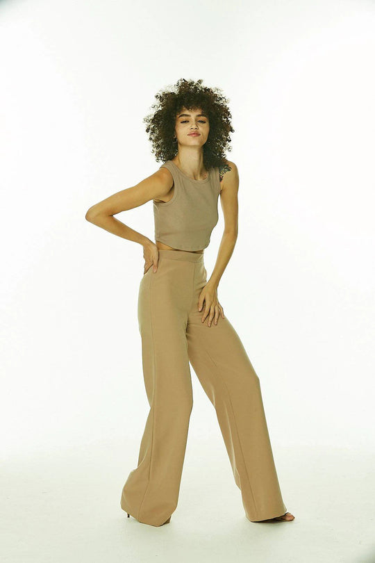 Nude Wide Leg Side Zip Pants with Faux Pockets
This is your go-to for all the latest trends, no matter who you are, where you're from and what you're up to. They have side front pockets, faux welt back pockets and invisible side zipper. Edit these pants to match your style. Created by us, styled by you. Fabric has a little bit of stretch and hugs the body in all the right places. Looks great with over blouses or tanks and jackets. Model height: 5"11 Waist Size Large: 31" Inseam: 36 Pants made extra for tall