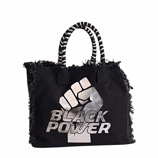 Black Power Shoulder Tote - Mesh - Blk/Silver
We have improved this best-selling bag! Now larger and roomier it's a shoulder tote and fully lined too! Fringe Bag Perfect everyday bag! - "Black Power" Fully lined canvas tote with soft-support bottom and bandana covered handles. Inside bag has 1 convenient inside zippered pockets and 2 insert pockets. Bag handles are at 7.5" drop and fits comfortably around the shoulder. Dimensions: 12"X14"X6.5" Made in USA
Black Power Shoulder Tote - Mesh - Blk/Silver
Gym Br