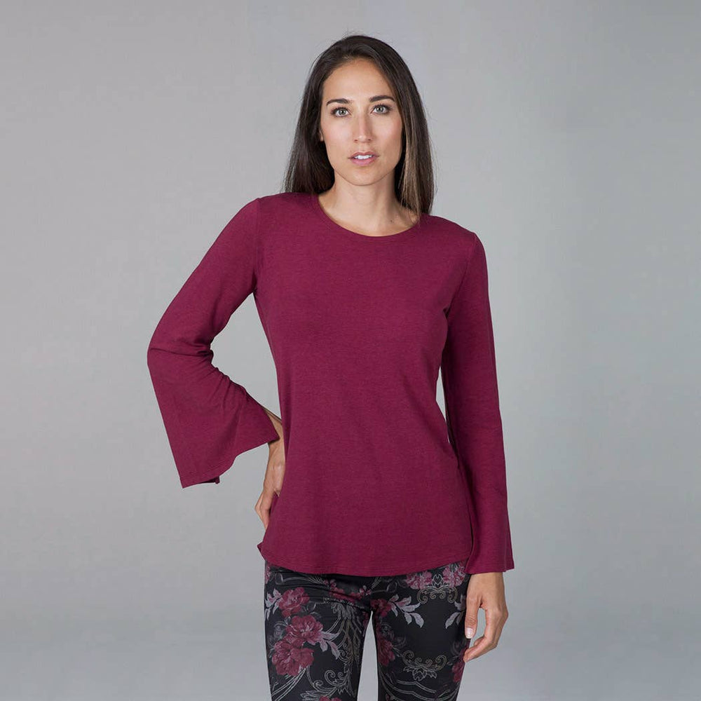 Slit Long Sleeve Yoga Tunic (Brandy) - Medium
Our Slit Long Sleeve Yoga Tunic in Brandy is the new must-have yoga top for any season. Top features a high neckline for cozy coverage and elegant slits on each sleeve, this beautiful long sleeve work out top is stylish enough to double as streetwear. Featuring: Made with organic cotton and spandex Moisture-wicking material Slit detailing on sleeves Made in U.S.A. of imported fabric
Slit Long Sleeve Yoga Tunic (Brandy) - Medium
Our Slit Long Sleeve Yoga Tunic in