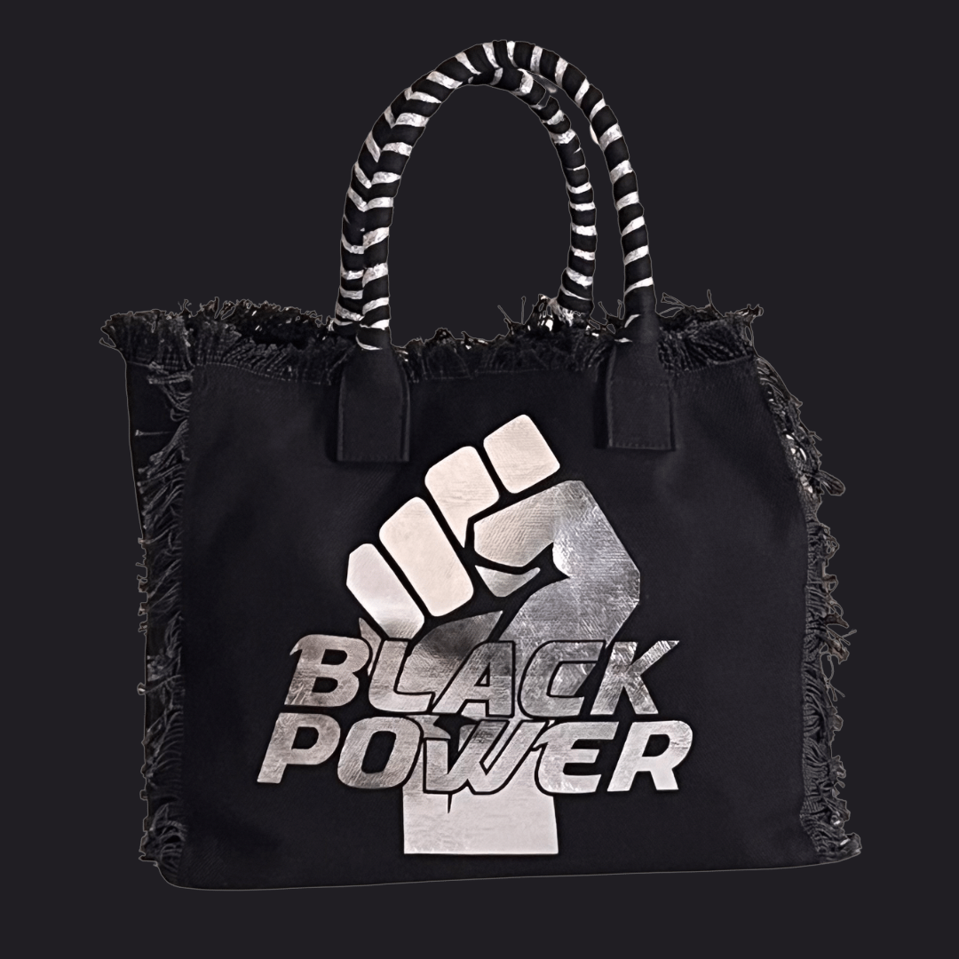 Black Power Shoulder Tote - Mesh - Blk/Silver
We have improved this best-selling bag! Now larger and roomier it's a shoulder tote and fully lined too! Fringe Bag Perfect everyday bag! - "Black Power" Fully lined canvas tote with soft-support bottom and bandana covered handles. Inside bag has 1 convenient inside zippered pockets and 2 insert pockets. Bag handles are at 7.5" drop and fits comfortably around the shoulder. Dimensions: 12"X14"X6.5" Made in USA
Black Power Shoulder Tote - Mesh - Blk/Silver
Gym Br