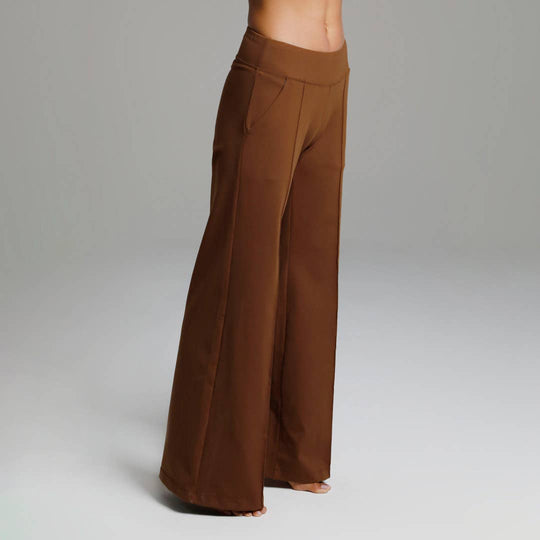 Perfect High Waist Wide Leg Pant (Bronze)
Why We Love This: These yoga dress pants take on the true meaning of activewear, taking you comfortably from the office, to the streets, to the yoga studio! Features: KiraGrace PowerStrong: Feels like cotton and keeps you dry High-rise, 32" Inseam Wide leg Made in U.S.A. of imported fabric Kira Grace PowerStrong: Supplex/Spandex *SUPPLEX® combines the traditional appeal of cotton with the performance benefits of modern fiber technology. Supplex fabrics are breathabl