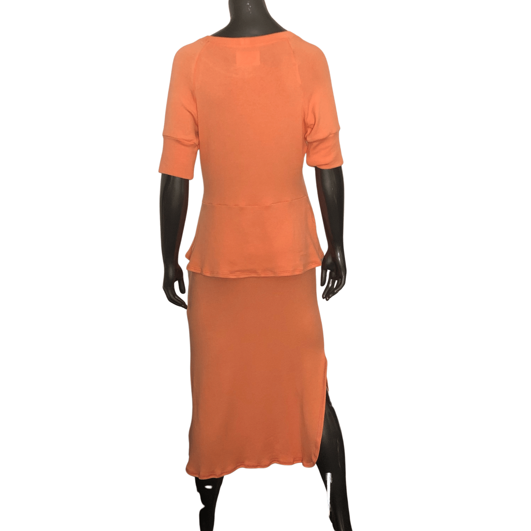 Cawaway Sweater & Shelby Skirt - Papaya
This USA made Caraway Top by Southcott Threads along with their signature Shelby skirt is the perfect weight that is shape fitting but not clingy, not see-through and made from the finest sustainable fabric. Papaya is a beautiful classic and vibrant color, luxuriously refined and that feels oh so soft to the touch and feels like nothing you have ever worn before... Materials: 65% Rayon 19% Cotton 14% Modal 2% Spandex Machine Wash Delicate | Lay Flat to Dry Model is we
