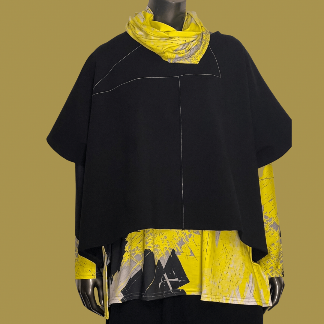 Punch the Crop Length Poncho - Black
An elegant top layer, this poncho is embellished with asymmetrical stitched-line designs at the front and back. Its dense, stretchy knit makes it ideal for travel and yields a beautiful drape. The fit is full generous and unstructured. The boxy silhouette has a wide, straight shape from shoulder to hem. Details: Oversized fit Cropped length boxy silhouette Intended for layering; long sleeve tee not included Open sides are tacked to create arm holes Hip length Model is 5'