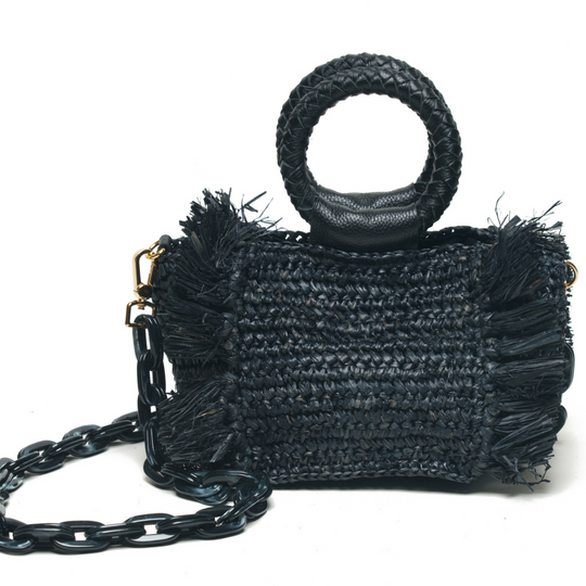 Capri Straw Bag - Black
Update your tote collection with this unique beige and black striped straw bag. The Marina features a classic black leather handle making it perfect for the beach or the fresh market. Style this classic straw bag with everything from a tunic to your favorite dress for an effortlessly polished look. FEATURES Marina Sand Beige and Black Striped Straw Bag Leather shoulder straps Leather snap closure Interior zip pocket Lined Imported
Capri Straw Bag - Black
Update your tote collection w