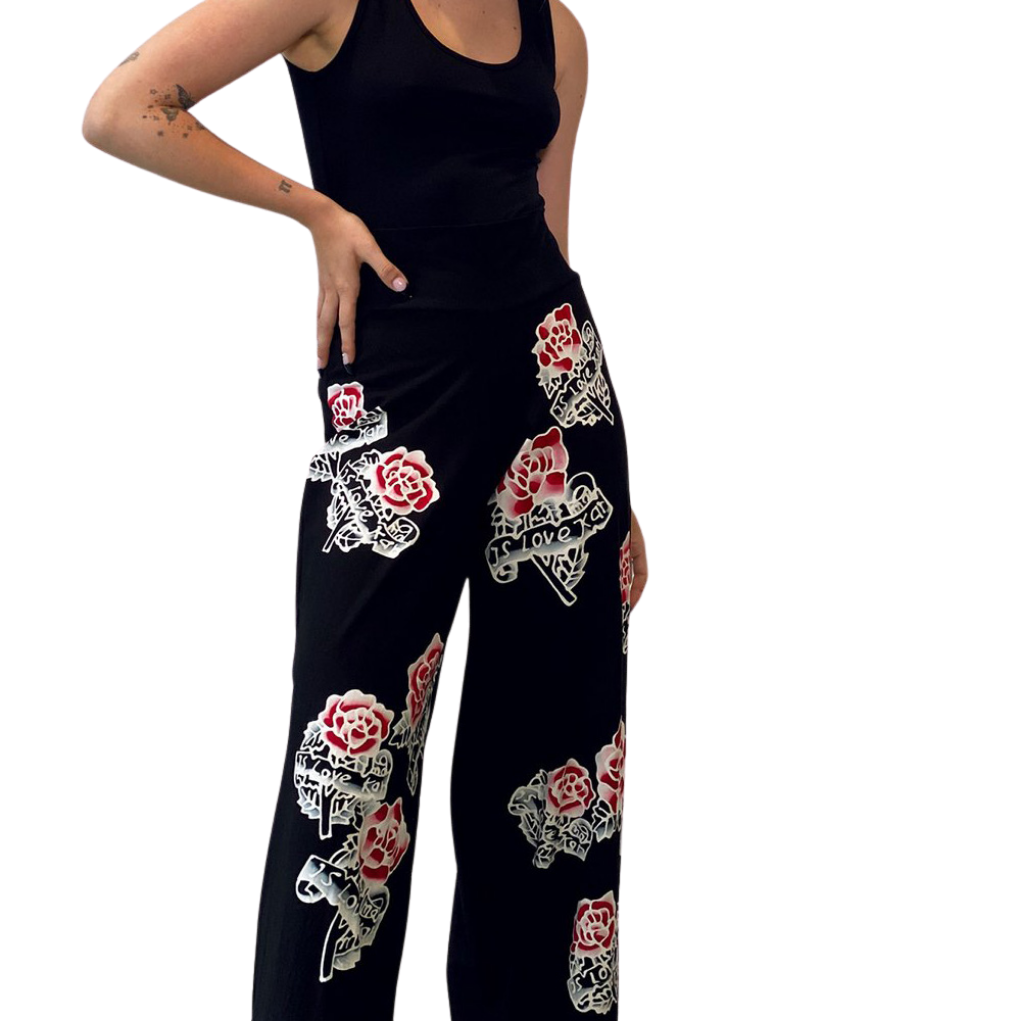 World Pant - Retro Roses Collection
Another FABULOUS version of our effortless wide-leg pants in an original hand painted motif. Fitted at the waist with gorgeous stretch and perfect-hitting length, this is a must have Rock ’N Karma hand painted wide leg pant. The relaxed structure of these pants ensures a comfortable, easygoing fit. Complete your look with our “detail blazer”. About Me 85% Rayon, 15% Lycra “Miracle Fabric” (thick) 2 way stretch for a move-with-you-feel Hand Painted Original Design Designed
