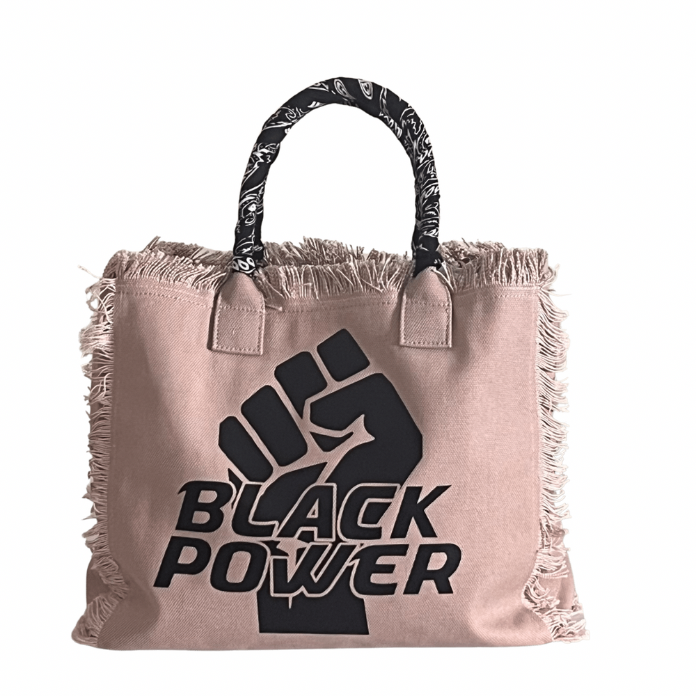 Black Power Shoulder Tote - Bandana - Beige
We have improved this best-selling bag! Now larger and roomier it's a shoulder tote and fully lined too! Fringe Bag Perfect everyday bag! - "Black Power" Fully lined canvas tote with soft-support bottom and bandana covered handles. Inside bag has 1 convenient inside zippered pockets and 2 insert pockets. Bag handles are at 7.5" drop and fits comfortably around the shoulder. Dimensions: 12"X14"X6.5" Made in USA
Black Power Shoulder Tote - Bandana - Beige
Gym Brat,