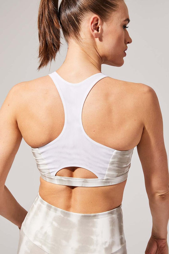 Exert Medium Support Bra - Recycled Performance Jersey
Exert Medium Support Bra - Recycled Performance Jersey Uncompromising support meets standout style with the Exert Recycled Polyester Medium Support Bra featuring ultra-soft sustainable fabric you can feel good about. Top features include a cutout detail at the back for added airflow and a built-in Coolmax® liner to ensure your assets stay cool and comfortable, no matter how hard you push your next sweat session. FEATURES Medium Support Secure structured