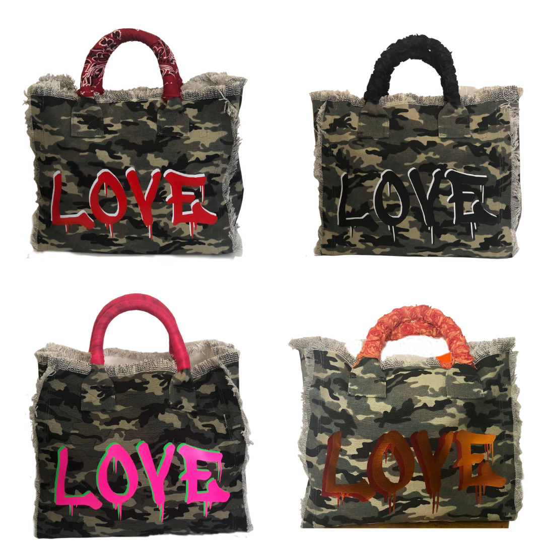 Fringe Camo LOVE Tote - Red Bandana
Fringe Bag Perfect everyday bag! - "Camo LOVE" in red text Canvas Tote with bandanna covered handles and convenient inside zippered pocket measuring 9" X 5" Dimensions: 12"X14"X5" Made in New York
Fringe Camo LOVE Tote - Red Bandana
Camo LOVE" in red text Canvas Tote with bandanna covered handles and convenient inside zippered pocket measuring 9" X 5" Dimensions: 14x13.5x6 Made in New York


$177
$177
$177
camo canvas tote bag, camo canvas totebag with love, camo print, c