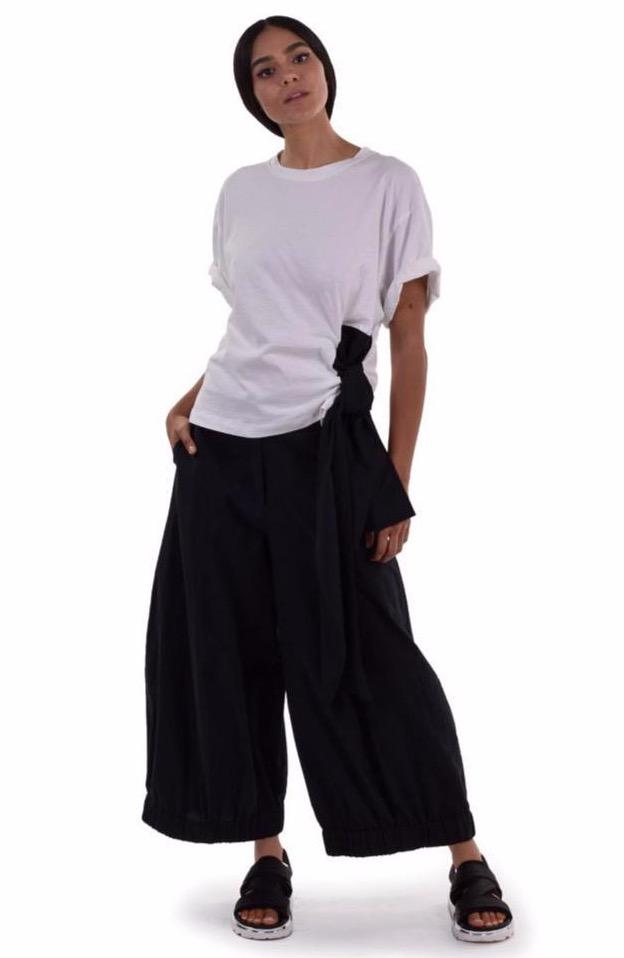 URBAN - Happiness Wide Leg Pant
The fit, feel and fabulous look of these pants = happiness! To start, they are pure cotton for cool, lightweight comfort. They're tailored for a smooth, figure-skimming fit through the waist and hips—then release to a wide-leg silhouette for a relaxed fit through the leg. Finally, the chic gathered hem adds tons of street-wise style. Fat front with zip fly and hidden closure; side pockets. 100% cotton Cold water wash, line dry Made in Israel
URBAN - Happiness Wide Leg Pant
To
