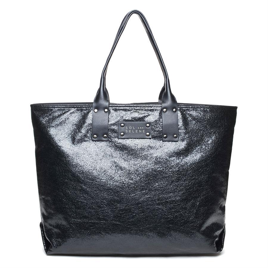 It Girl Reversible Tote - Black Metallic
This reversible tote features a shimmery metallic fabric on one side, and a smooth neutral nylon on the other. Ready to turn heads from your front doorstep to a far-flung corner of the globe, this split personality tote offers ample room for all your favorites. We've even included a detachable pouch to store whatever you need for your best ‘it' look. Beautiful tough. Powerful pretty. Life is about contradictions – so is the It Girl. Type: Tote Composition: Vegan Leat