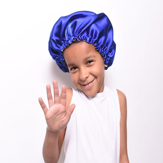 Kids Satin Hair Bonnet - XSmall
Satin hair bonnets are a staple for protecting your hair at night. The benefits of satin is that it helps reduce friction which can cause hair damage. Additionally if you have added any products to your child's hair before going to bed the satin bonnet will protect your pillow covering. These bonnets are bonus filled, they protect your hair, your linens and on top of all this your darling is going to be so excited to be wearing such a beautiful headpiece. Details: Bonnets are