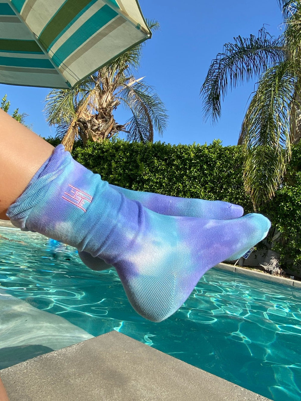 Tie Dye Sock & Scrunchie Set - Aqua Purple
Tie Dye Ruffle Sock with Matching Tie Dye Scrunchie Set The tie dye phenomenon lives on! These socks are crafted to perfection in this tie dye soft stretch cotton socks with a ruffle trim. and Each pair comes with matching large tie dye velvet scrunchie and personalized packaging. Hand-dyed design. Each pair is unique due to the dyeing process and come in a longer length for multiple styling options. Wear them with your favorite sneakers, sandals and heels. With or