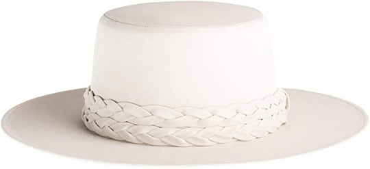 Off White Vegan Leather Cordobes Hat
The structured design of the Off-White hat is composed of vegan leather that is soft to the touch. It’s the perfect vibrant color of white. Finished with a statement double braid, it’s an updated take on the classic Spanish cordobes hat. Vegan leather. Large - 61 cm, Medium - 58 cm Brim 3” Crown 4” Cordobes crown Double braided trim Inner elastic Spot/clean with cloth
Off White Vegan Leather Cordobes Hat
The structured design of the Off-White hat is composed of vegan lea