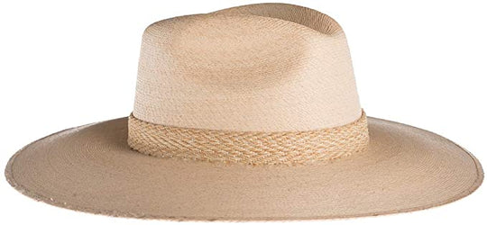 Serena Palm Leaf Fedora Hat
The glamorous Serena hat is the perfect straw hat to offer full sun protection. Its body is braided by artisan hands and interlaced with palm leaves to create the finished design. It’s completed with a rustic cotton braided trim. 100% Palm leaf, natural color Medium 58 cm Crown 4” Brim 11 cm Fedora crown Cotton braided trim Inner elastic Spot/special cleaning
Serena Palm Leaf Fedora Hat
Glamorous Serena hat is the perfect straw hat to offer full sun protection. Its body is braide