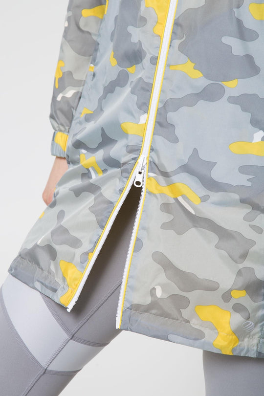 H20 Innovate Reversible Camo Jacket - Lemon
Offering both a colorful camo print and a classic solid shade, this 2-in-1 reversible anorak has it all! The solid color option includes exposed drawcords while the streamlined camo side offers a piping detail along the zipper in the reverse solid shade. A variety of customization options offer the perfect fit, making it easy to go from an A-line to hour glass shape in seconds. Both sides offer invisible zip pockets and a convenient 2-way zipper. When unexpected w