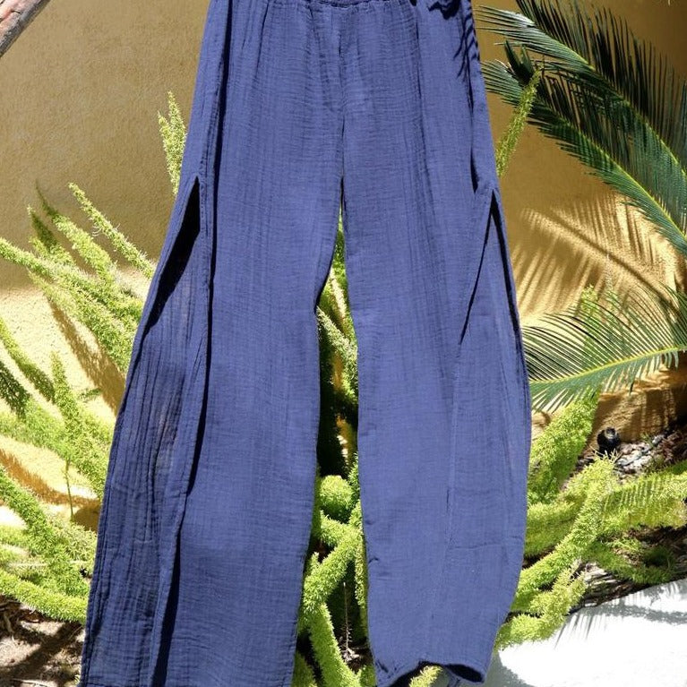 Cotton Side Slit Pant - Navy
A STARKx best seller and personal favorite. These pants are medium rise, have a skinny elastic waist for comfort and high side seam slits. Pair with heals, boots, tennis shoes and even barefoot. Tie the opening together at the ankle for a harem pant look. Medium rise Skinny elastic waist High seam slit 100% cotton gauze Machine wash cold water, Dry on low, Low iron
Cotton Side Slit Pant - Navy
These pants are medium rise, have a skinny elastic waist for comfort and high side sea