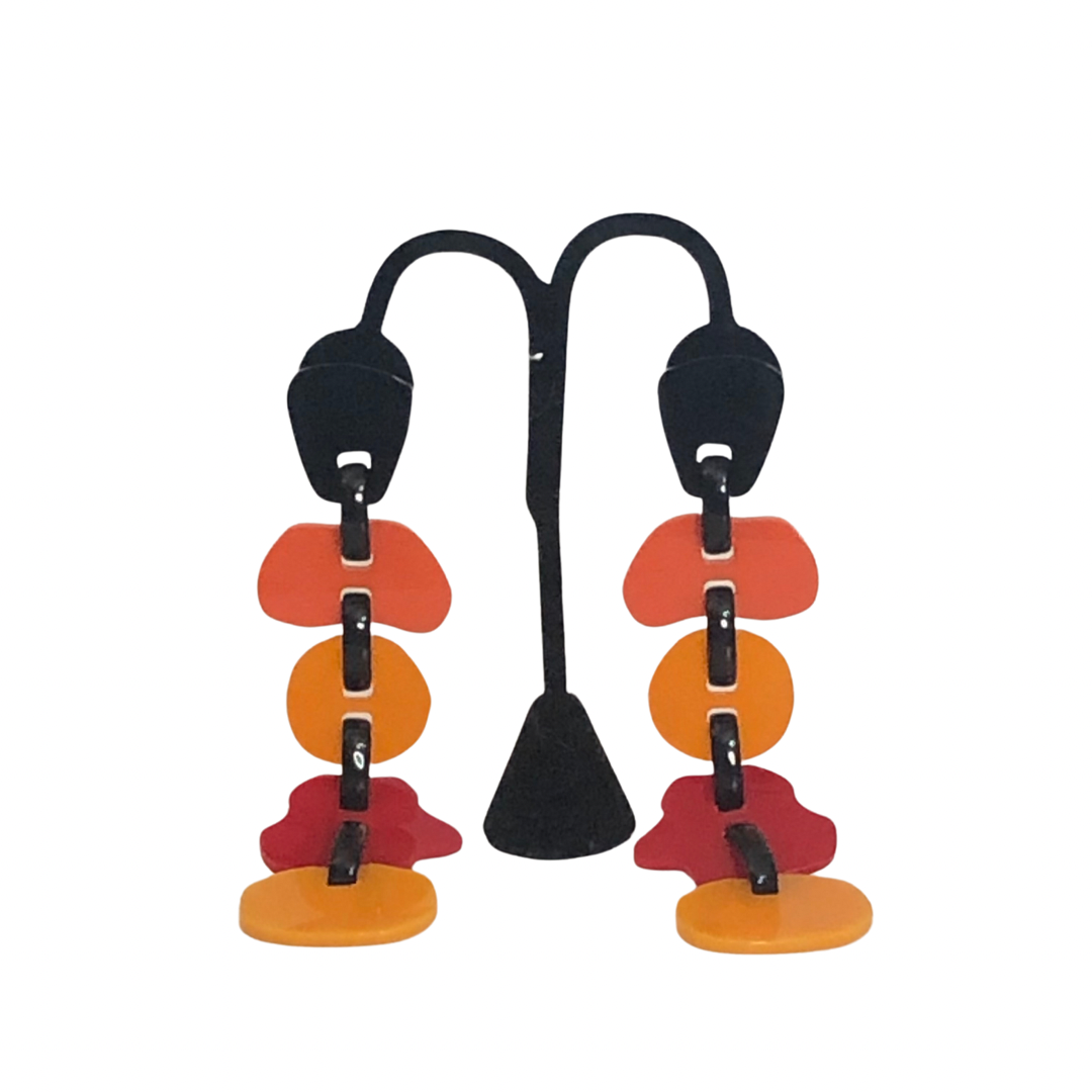 Totem Oranges - Earrings
Bold and beautiful, the Michaela Malin Totem Earrings are whimsical and striking. Perfect for any occasion. Material: AcrylicOrigin: Made in Israel Lightweight Clip closure 5" long Encapsulating the spirit of innovation, Michaela Malin derives inspiration for her designs and aesthetics from architectural forms and way of thought.
Totem Oranges - Earrings
Bold and beautiful, the Michaela Malin Totem Earrings are whimsical and striking. Perfect for any occasion. Material: Acrylic


$1