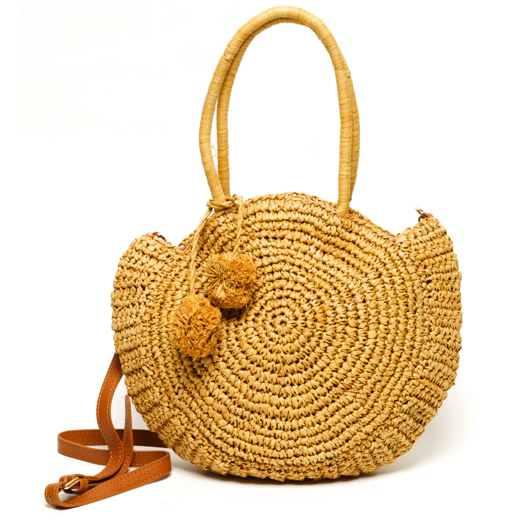 Rio Straw Handbag - Natural
Update your tote collection with this unique beige and black striped straw bag. The Rio features a classic braided handle making it perfect for the beach or the fresh market. Style this classic straw bag with everything from a tunic to your favorite dress for an effortlessly polished look. FEATURES Rio Sand Beige and Black Striped Straw Bag Braided shoulder straps Leather snap closure Interior zip pocket Lined Imported
Rio Straw Handbag - Natural
Update your tote collection with