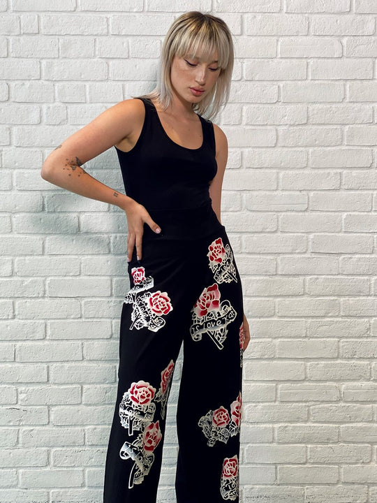 World Pant - Retro Roses Collection
Another FABULOUS version of our effortless wide-leg pants in an original hand painted motif. Fitted at the waist with gorgeous stretch and perfect-hitting length, this is a must have Rock ’N Karma hand painted wide leg pant. The relaxed structure of these pants ensures a comfortable, easygoing fit. Complete your look with our “detail blazer”. About Me 85% Rayon, 15% Lycra “Miracle Fabric” (thick) 2 way stretch for a move-with-you-feel Hand Painted Original Design Designed