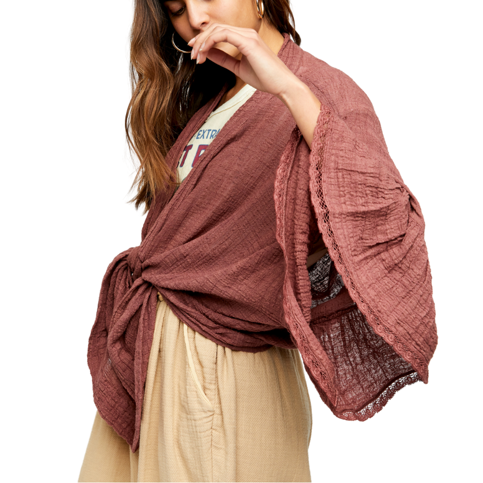 Poppy Oversize Ruffle Sleeves Kimono Jacket
A kimono makes a breezy alternative to a kimono, especially when it's Free People's lace-trimmed, oversized version. ABOUT THE BRAND: Imported Kimono sleeves; lace trim Shawl collar; open front Size & Fit Approx. model height is 5'10" and she is wearing size small If you love the laid-back charm of boho-chic apparel, you'll find a beautiful selection of clothing from Free People at Macy's that fits your style. From ultra-feminine dresses to cute, flirty tops, brow