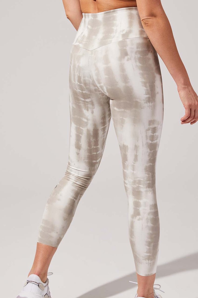 Strive 7/8 Leggings - Neutral Tie Dye
Made for movement, the Strive High Waisted Recycled Polyester 7/8 Legging features sustainable fabric in a variety of ultra-trendy prints, boasting excellent coverage, breathability and compression in all the right spots. Top features include a wide supportive waistband with a concealed pocket and clean-finished seams for 360-degree comfort and coverage Features Recycled Peached Interlock Jersey Offers excellent coverage, 4-way stretch & breathability Sustainable Style
