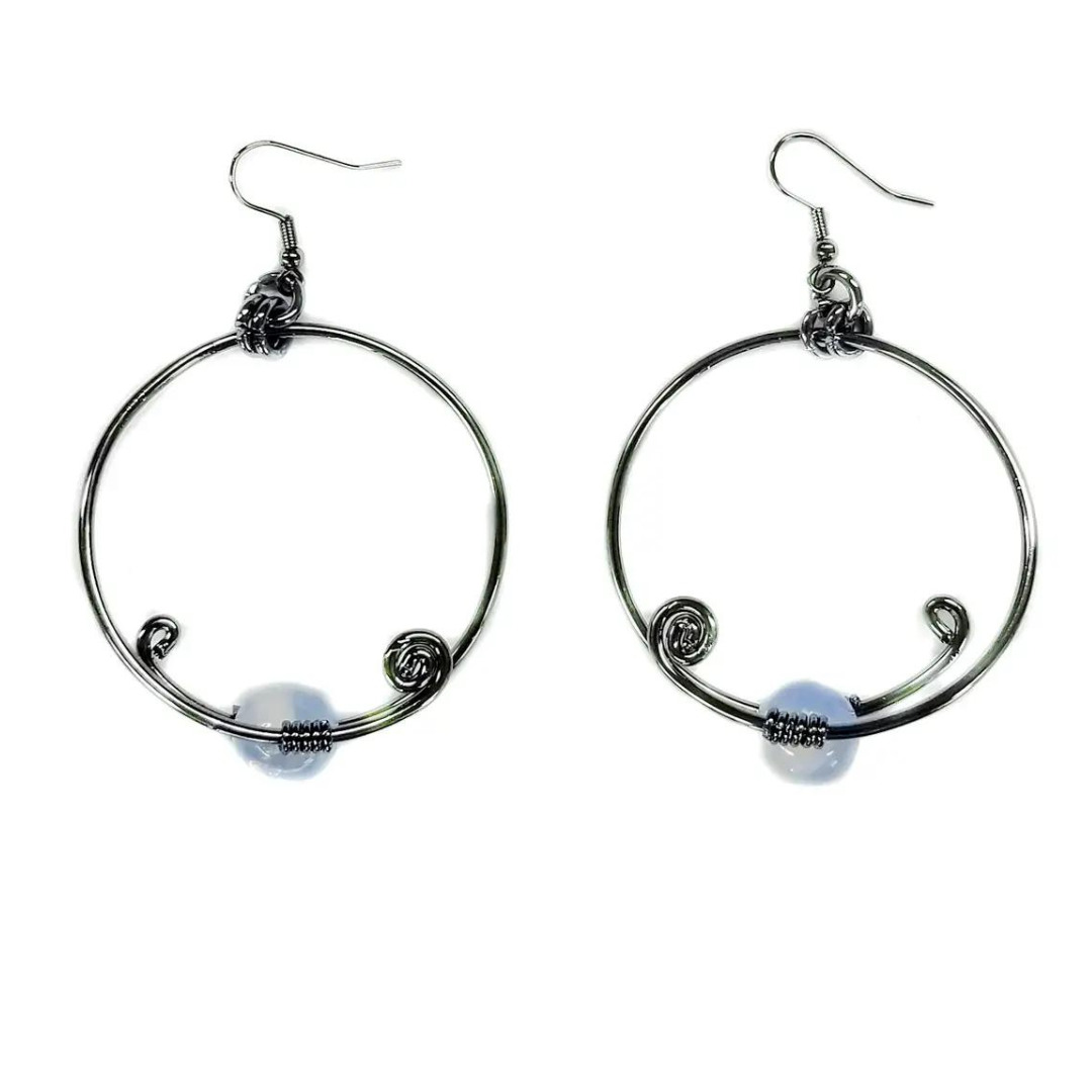 hand made gun metal plated wire earrings are accented opal natural stone. They are a stunning statement piece.  Features: Unique Wire Earrings  One of a kind design Nickel free and hypoallergenic Diameter 1 5/8"
