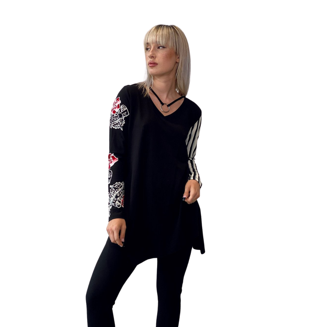 Ring Tunic - Retro Roses
Bringing back one of the brand’s all time popular classic in a striking motif this FALL, this Rock ‘N Karma tunic is designed to drape loosely over the body. Made from the brand’s signature 2-way stretch miracle fabric, it has an elegant V-neckline and long sleeves. The side splits and uneven hem mean it will layer beautifully over slim-fitting pants. About Me 85% Rayon, 15% Lycra “Miracle Fabric” 2 way stretch for a move-with-you-feel Hand Painted Original Design Designed for a rel
