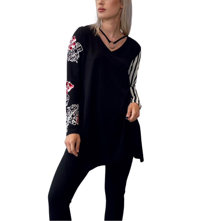 Ring Tunic - Retro Roses
Bringing back one of the brand’s all time popular classic in a striking motif this FALL, this Rock ‘N Karma tunic is designed to drape loosely over the body. Made from the brand’s signature 2-way stretch miracle fabric, it has an elegant V-neckline and long sleeves. The side splits and uneven hem mean it will layer beautifully over slim-fitting pants. About Me 85% Rayon, 15% Lycra “Miracle Fabric” 2 way stretch for a move-with-you-feel Hand Painted Original Design Designed for a rel