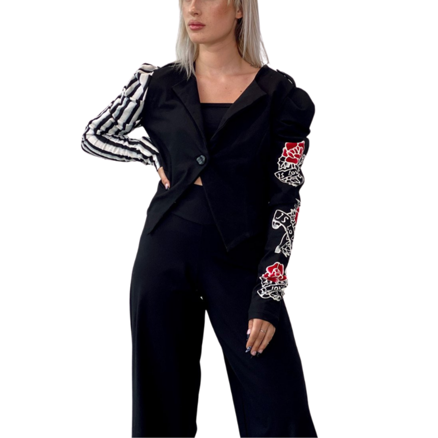 Detail Blazer Jacket - Retro Roses
Leave it to the designer duo to make the classic ruched shoulder jacket and make it so glamorous and cool. Tailored from the brand’s signature thick miracle fabric that gives you the sharp look of a blazer but comfort of loungewear. It features a striking hand painted original motif and cropped to hit the smallest part of your waist. About Me 85% Rayon, 15% Lycra “Miracle Fabric” (thick) 2 way stretch for a move-with-you-feel Hand Painted Original Design Designed for a fit