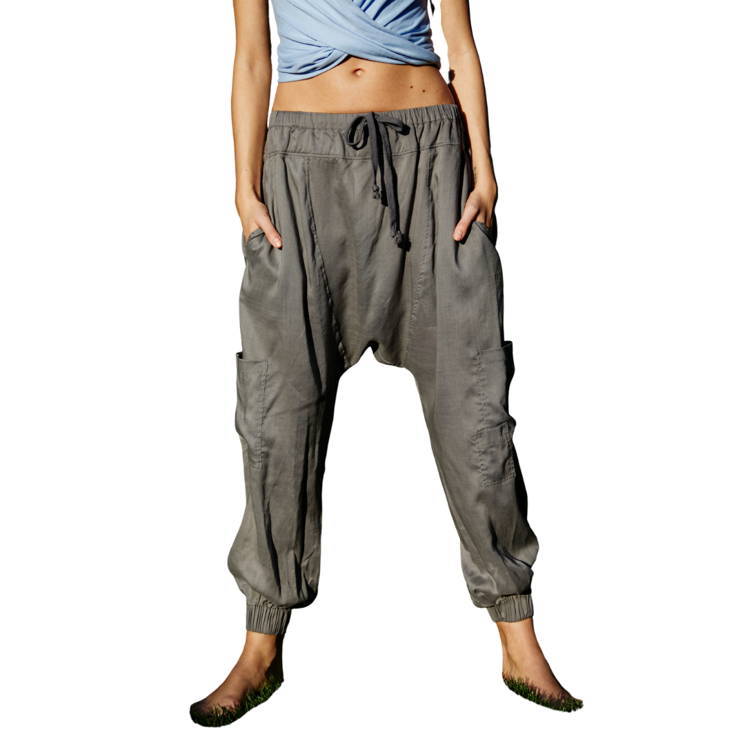 Rise To The Sun Solid Harem Pants
Perfect for every day, these so comfy harem pants feature a dramatic drop crotch detail with tapered legs, deep pockets and a drawstring waistband. Adjustable waistband Cinched ankles Relaxed fit What’s Care FP? This product was consciously made to reduce our footprint and supports our mission to be a little bit better every day. Specifically, this product was made with Eco-Conscious Design: It contains at least 50% of a certified eco-conscious fiber or process. FP Movement