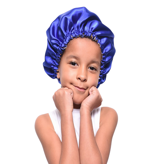 Kids Satin Hair Bonnet - XSmall
Satin hair bonnets are a staple for protecting your hair at night. The benefits of satin is that it helps reduce friction which can cause hair damage. Additionally if you have added any products to your child's hair before going to bed the satin bonnet will protect your pillow covering. These bonnets are bonus filled, they protect your hair, your linens and on top of all this your darling is going to be so excited to be wearing such a beautiful headpiece. Details: Bonnets are