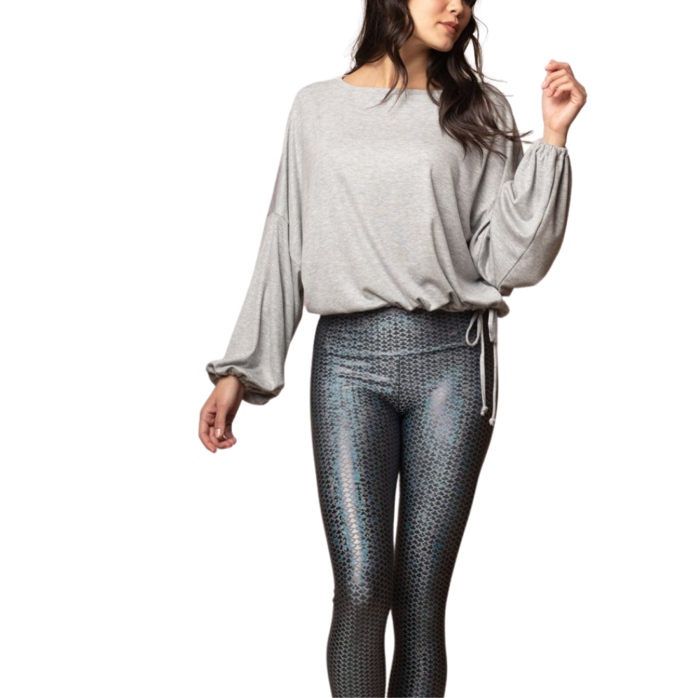 Cassidy Ribbed Knit Top - Heather
The new slouchy, oversized CASSIDY top features a beautiful boat neck, flowing gathered bell sleeves, and a drawstring tie waist. The luxuriously soft, stretchy black ribbed knit drapes gorgeously over the body. The perfect piece to pair with our leggings for an on-trend studio to street look. FABRIC 92% rayon/8% spandex4-way stretch SIZING XS/S and M/L (Model is 5'5" wearing size XS/S) CARE Wash inside out in cold water; no bleach; hang or lay flat to dry. Do not iron. Han