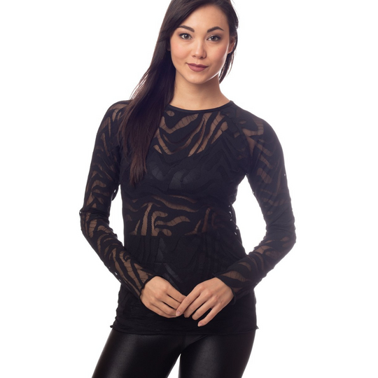 Panthera Performance Mesh Top
Luxuriously sleek, the PANTHERA top features a beautiful black zebra smesh print with long pearl-edged raglan sleeves and hem. Layer it over a sports bra for a peekaboo look or a tank for more coverage. FABRIC 80% nylon/20% spandex4-way stretch SIZING S-M-L (Model is 5'5" wearing size S) CARE Wash inside out in cold water; no bleach; hang or lay flat to dry. Do not iron. DESIGNS are handmade in the USA
Panthera Performance Mesh Top
Luxuriously sleek top features a beautiful bla