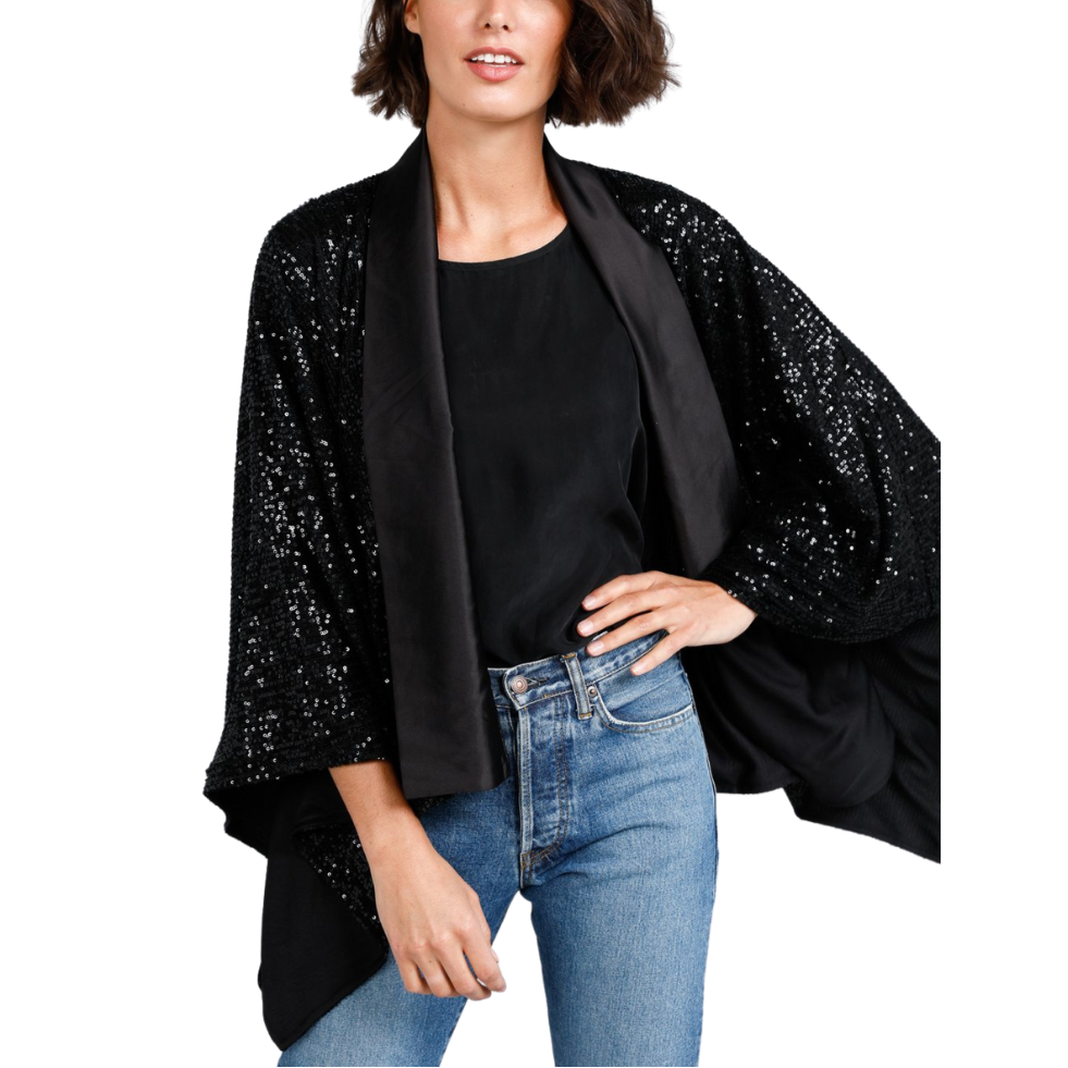 Jagger Kimono - Black Sequin Sparkles
Destined to dazzle, the Jagger Kimono composes a striking silhouette with gorgeous drape. Drenched in decadent all-over sequin embellishments, this style is perfect for party season! Part of the the Brave+True Everywoman Collection • Satin neckband• Fully lined• One size garment• Fabulous sequin fabricMeasurements:Bust = OS: 58"Length = OS:23" Model is 5'6" tallFabrication:Main: 100% polyesterLining: 100% polyester
Jagger Kimono - Black Sequin Sparkles
Destined to dazzl