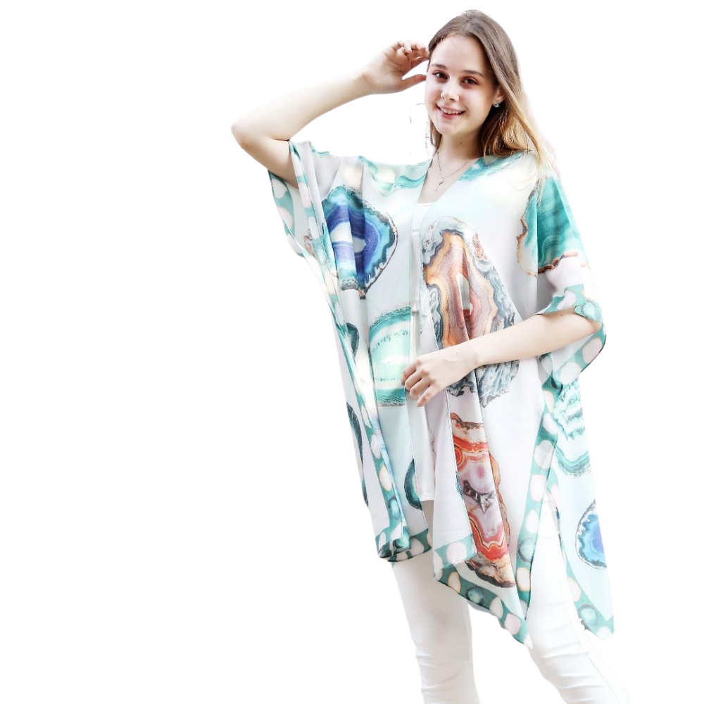Aqua Crystal Stone Print Sheer Kimono
Aqua print crystal stone print kimono with beautiful large stones printed throughout. Great accent piece for any outfit. 34'' long from high point of shoulder to hem Fits sizes 2-16 100% cotton Hand wash cold water; dry flat Imported
Aqua Crystal Stone Print Sheer Kimono
Aqua crystal stone print kimono with beautiful large stones printed throughout. Great accent piece for any outfit. 32'' long from high point of shoulder to hem


$24.99
$24.99
$24.99
cotton kimono, kimo