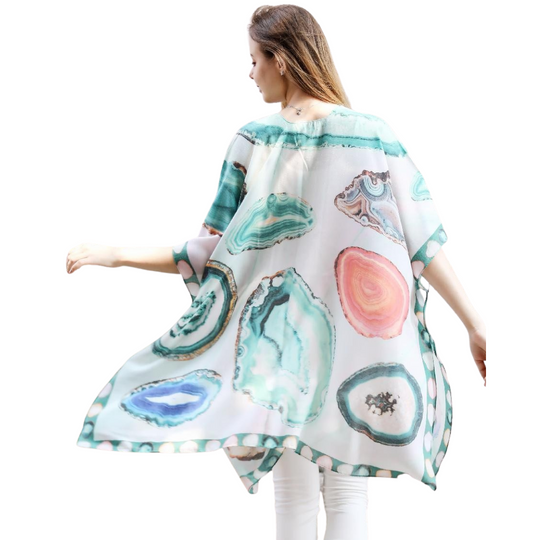 Aqua Crystal Stone Print Sheer Kimono
Aqua print crystal stone print kimono with beautiful large stones printed throughout. Great accent piece for any outfit. 34'' long from high point of shoulder to hem Fits sizes 2-16 100% cotton Hand wash cold water; dry flat Imported
Aqua Crystal Stone Print Sheer Kimono
Aqua crystal stone print kimono with beautiful large stones printed throughout. Great accent piece for any outfit. 32'' long from high point of shoulder to hem


$24.99
$24.99
$24.99
cotton kimono, kimo
