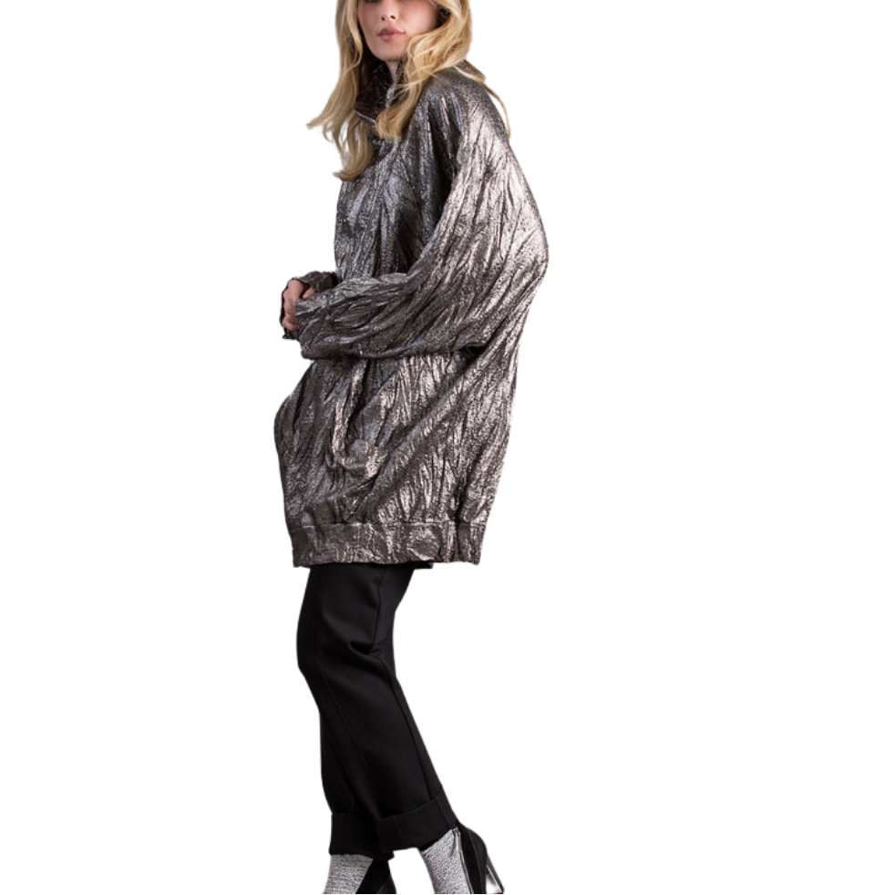 Metallic Cowl Neck Tunic Dress - Gold
You can wear this sharp metallic tunic pullover with or without leggings. It has front pockets that accents the style so you can choose to dress it up or dress it down. The length is long enough but short enough to get their attention but still keep them wondering. Pair it with booties or just over the knee boots.
Metallic Cowl Neck Tunic Dress - Gold
Sharp metallic tunic pullover can be worn with or without leggings. It has front pockets that accents the style so you c