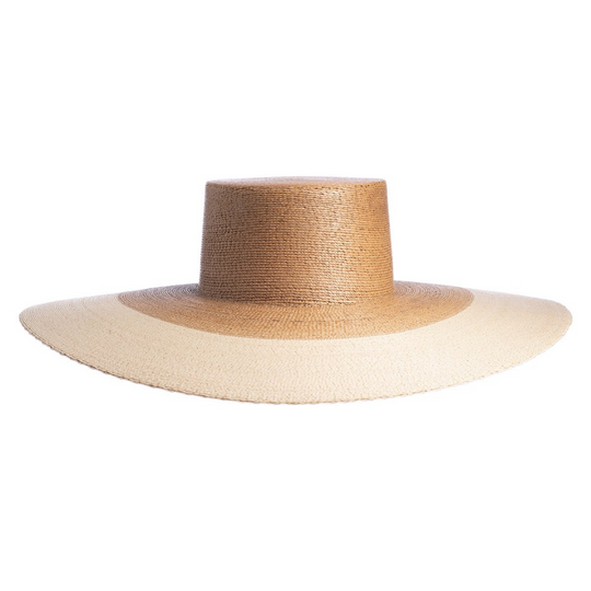 Mallorca
Our ultra wide palma Mallorca hat is elegant and flawlessly finished with a light tone brim. Its body is braided by artisan hands and interlaced with palm leaves to create the finished design. 100% Palm leaf, natural color (One Size) Standard Medium 58 cm Crown 4” Brim 5.51" Flat top crown Inner elastic Spot/special cleaning FIT SCALE True to size
Mallorca
Our ultra wide palma Mallorca hat is elegant and flawlessly finished with a light tone brim. Its body is braided by artisan hands & interlaced w