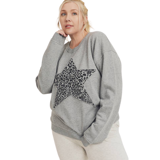 Cheetah Star Terry Sweatshirt - CRVY - Grey
The Cheetah Print Antique Star sweatshirt is a sure winner. This pullover was crafted using a 100% cotton terry fabric. It features a rounded neckline, long sleeves, and a single star cheetah print graphic on the front with an antiqued finish. Fabric: 100% cotton terry Machine wash cold with like colors and tumble dry low Country of Origin: CN
Cheetah Star Terry Sweatshirt - CRVY - Grey
This pullover is 100% cotton terry fabric. It features a rounded neckline, lon