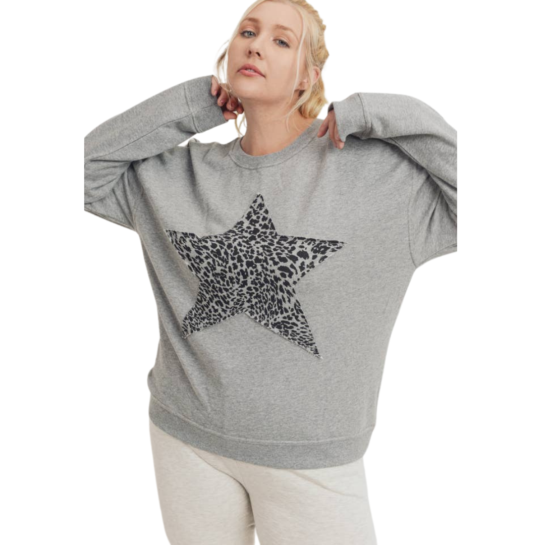 Cheetah Star Terry Sweatshirt - CRVY - Grey
The Cheetah Print Antique Star sweatshirt is a sure winner. This pullover was crafted using a 100% cotton terry fabric. It features a rounded neckline, long sleeves, and a single star cheetah print graphic on the front with an antiqued finish. Fabric: 100% cotton terry Machine wash cold with like colors and tumble dry low Country of Origin: CN
Cheetah Star Terry Sweatshirt - CRVY - Grey
This pullover is 100% cotton terry fabric. It features a rounded neckline, lon
