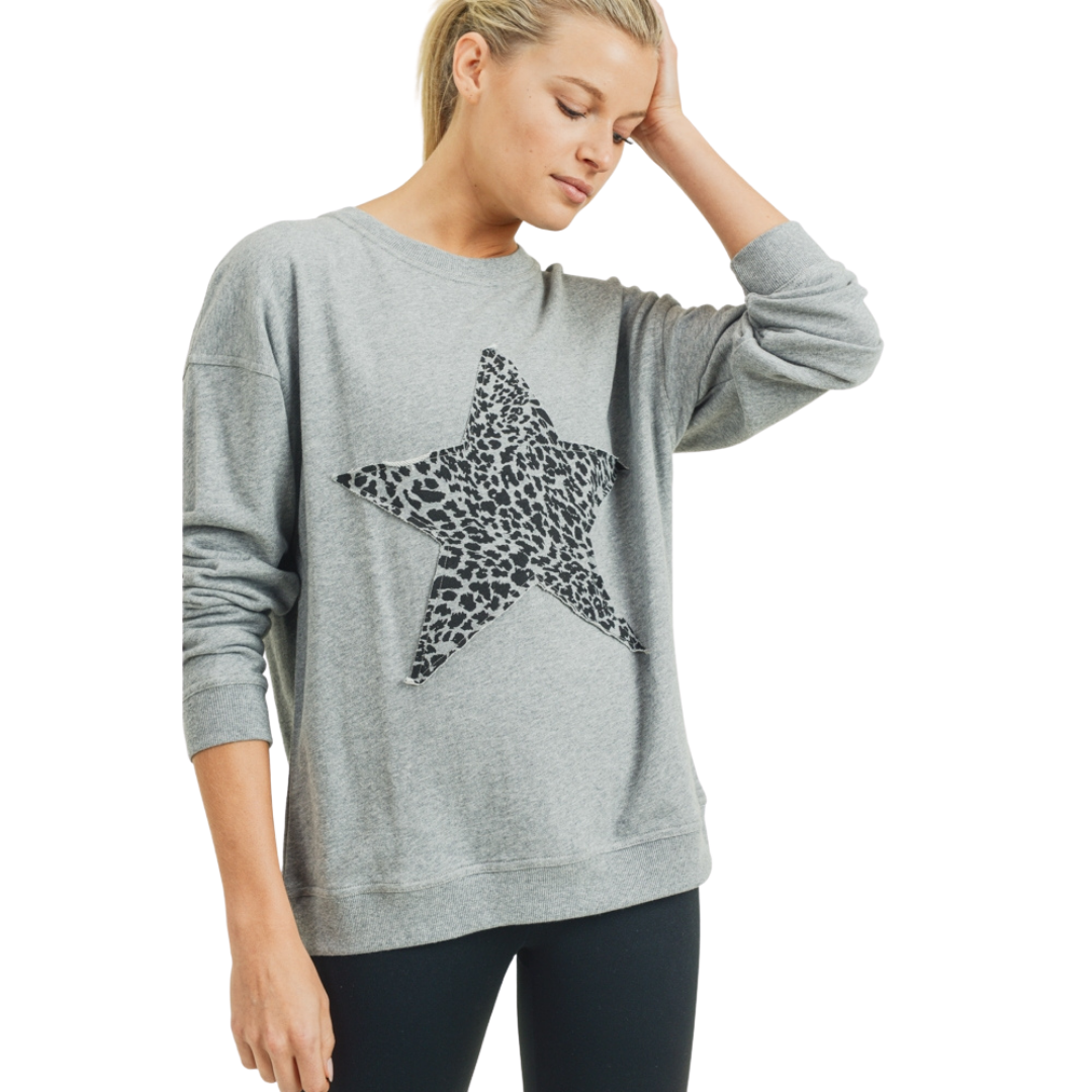 Antiqued Star Cheetah Print Sweatshirt- Grey
This pullover was crafted using a 100% cotton terry fabric. It features a rounded neckline, long sleeves, and a single star cheetah print graphic on the front with an antiqued finish. Fabric: 100% cotton terry Machine wash cold with like colors and tumble dry low Country of Origin: CN
Antiqued Star Cheetah Print Sweatshirt- Grey
This pullover is 100% cotton terry fabric. It features a rounded neckline, long sleeves, and a single star graphic on the front with an