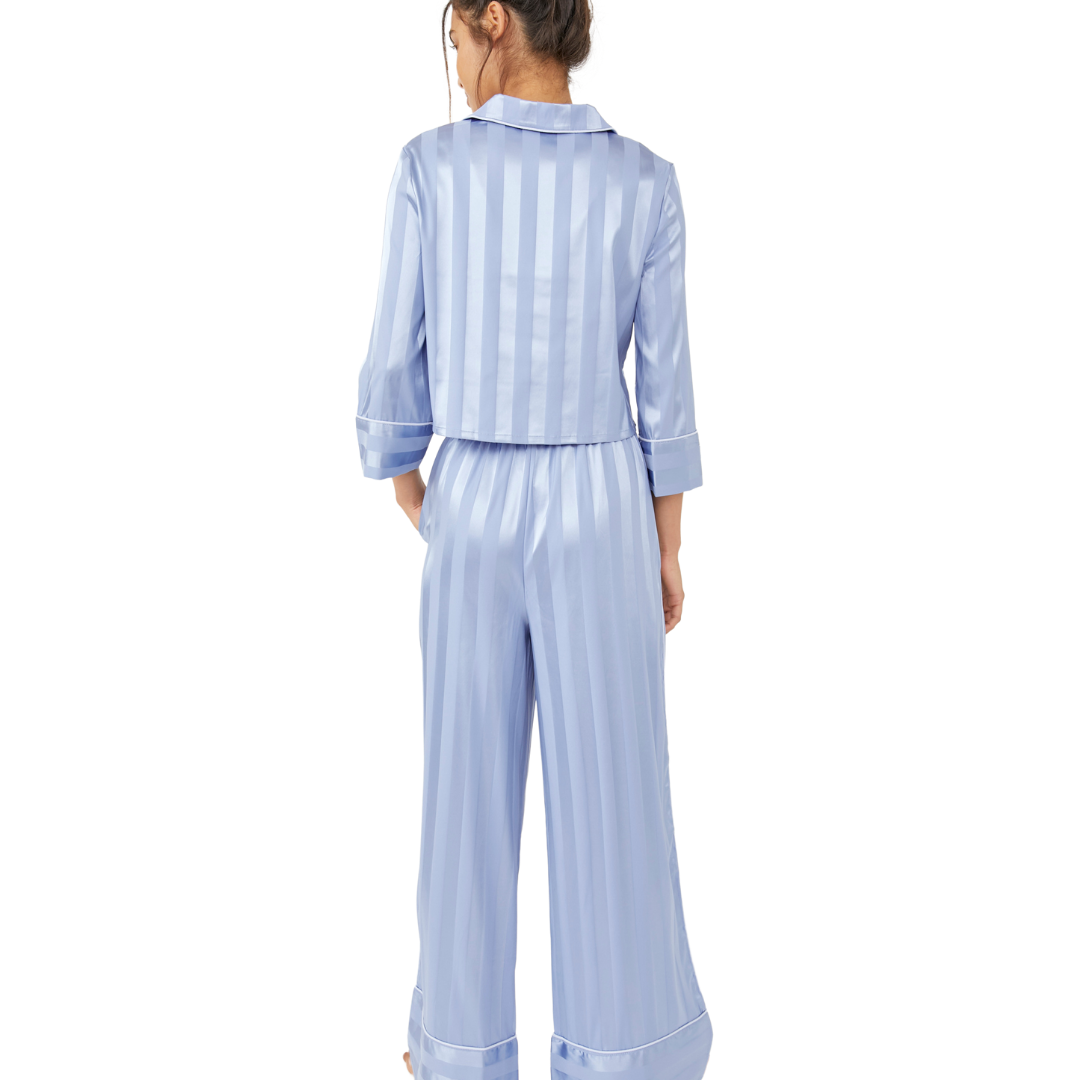 Pajama Party Sleep Set - Hazy Blue
Pajamas you can get away with wearing outside of the house, this so stunning set features a matching collared shirt and wide-leg bottoms in a feminine floral print design. Top: Button-up front Cropped sleeves Chest-pocket Cropped silhouette Bottoms: Pull-on style Elastic waistband Relaxed fit legs Lightweight style Intimately Our softest intimates and best-ever base layers. Intimately is an in-house label. Care/Import Machine Wash Cold Import Contents: 97% Polyester, 3% Sp