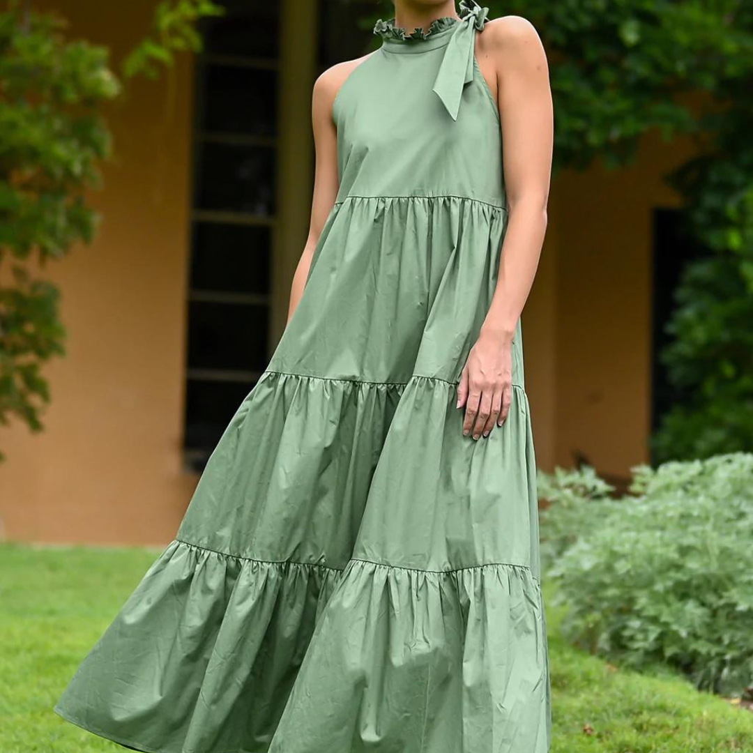 Helena Tiered Dress - Sage
Our Helena Dress is restocked. The Helena has a high collar that ties at the side of the neck. This loose fitting maxi is cut from cotton-poplin that's crisp and breathable and falls in a﻿ trapeze silhouette to the ankle. Just throw your Helena on and team her with sandals, sneakers or heals - perfect for any occasion. Also comes in Black If in doubt about sizing please check bust circumstance Fitted through bust than falls loosely to ankles Ties at side of neck Round Neck Side po