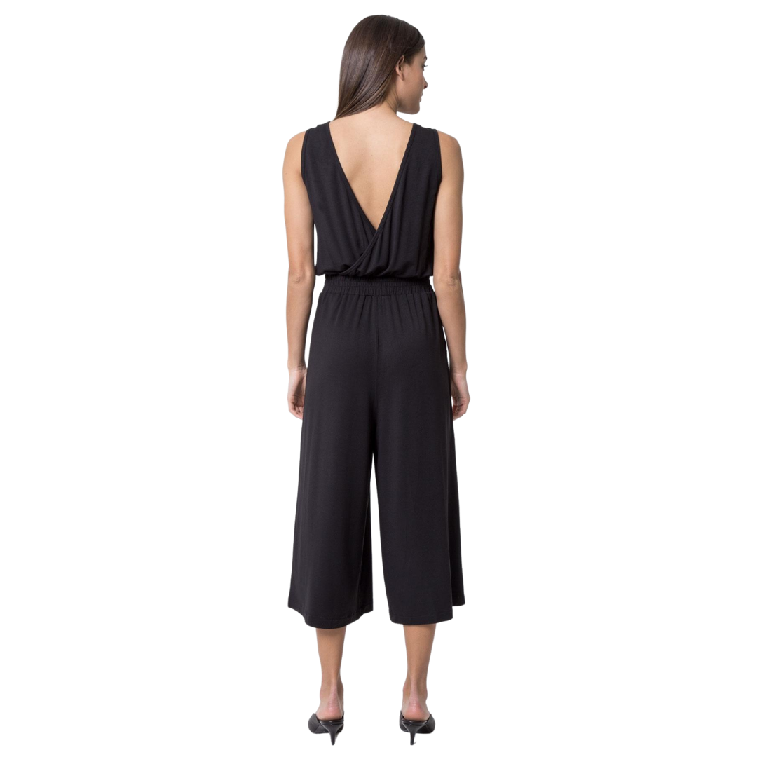 Trendsetter Luxe Cropped Jumpsuit
With an of-the-moment fit and a versatile hem, this sophisticated jumpsuit makes styling effortless and works with sandals, sneakers or casual heels. An exposed back design with crossover detail has an alluring effect (and also looks great with a tank layered underneath for added coverage). A comfortable gathered elastic waistband creates a feminine hourglass shape, balanced out by a roomy wide leg cut. You'll love the naturally breathable fabric with inherent drape and a l