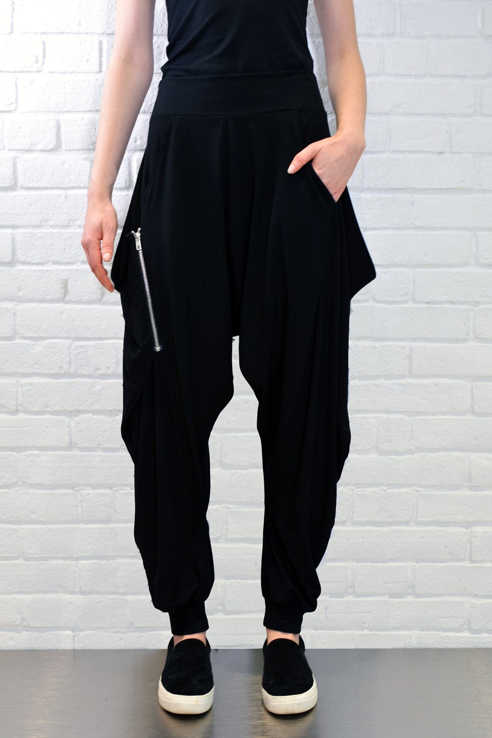 Angle Zipper Pant - Black Solid
Our top selling drop crotch pant! It is high rise and has slouchy side pockets with zipper detailing. With an edgy vibe, these pants are powerful enough to command a room but discrete enough to be a lounge-worthy essential. Made with our 2- way- stretch miracle fabric, these pants are designed to move with you. Feel effortlessly cool and incredibly comfortable, anywhere, anytime and any season. About Me: 85% Rayon, 15% Lycra “Miracle Fabric” 2 way stretch for a move-with-you-