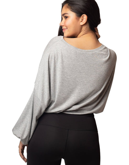 Cassidy Ribbed Knit Top - Heather
The new slouchy, oversized CASSIDY top features a beautiful boat neck, flowing gathered bell sleeves, and a drawstring tie waist. The luxuriously soft, stretchy black ribbed knit drapes gorgeously over the body. The perfect piece to pair with our leggings for an on-trend studio to street look. FABRIC 92% rayon/8% spandex4-way stretch SIZING XS/S and M/L (Model is 5'5" wearing size XS/S) CARE Wash inside out in cold water; no bleach; hang or lay flat to dry. Do not iron. Han