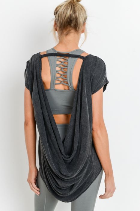 Open Back Drape Mineral Wash Top
We love this open back drape mineral wash top. This is such an avant-garde athleisure piece! The front offers a casual, round-neck look with tulip-style sleeves and bottom hem, whilst the back has a strap just under the nape of the neck and romantic, drape accent that hangs under a bold cut-out. Fabric: 95% rayon, 5% spandex.
Open Back Drape Mineral Wash Top
The front offers a casual, round-neck look with tulip-style sleeves and back has a strap just under the nape of the ne